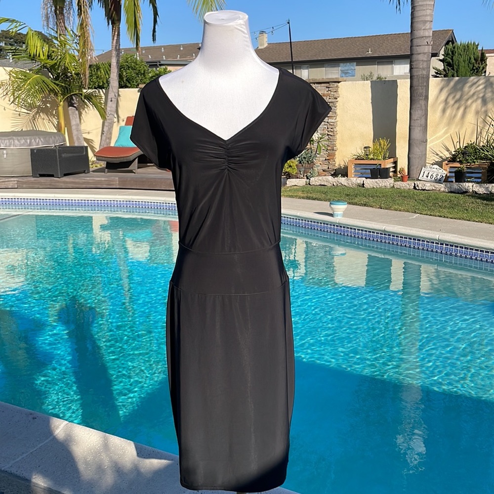 Very sexy little black dress by Express | Size Small | Open back (lower)